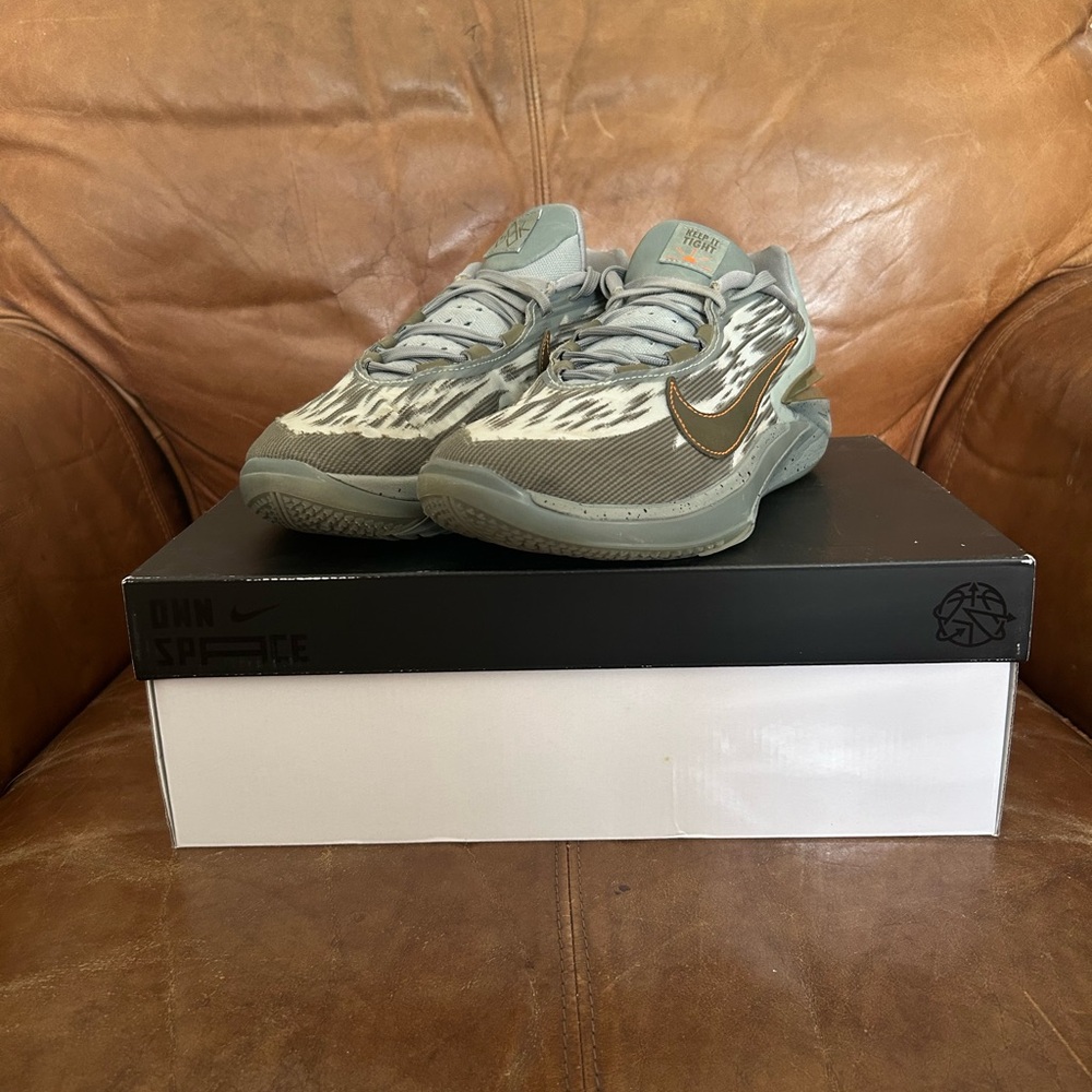 Nike Athletic Shoes in Gray and Gold